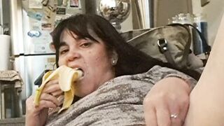 slut milf eats banana from her pussy