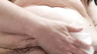 Wife cleaning her hairy pussy