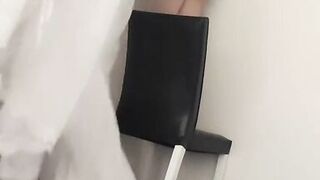 Sexy beautiful woman wearing completely nude curtains in her home.