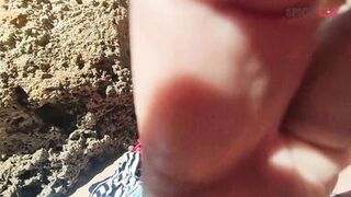Blowjob with cumshot on a crowded beach...