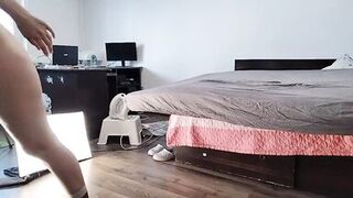 Sexy Latina Having Fun Trying on Clothes and Cutting Them.