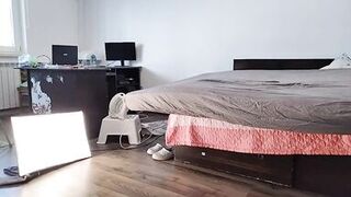 Sexy Latina Having Fun Trying on Clothes and Cutting Them.