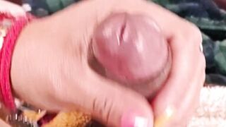 She masturbates me and my penis gets wet with droplets of pleasure.