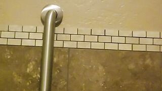 Horny milf plays in bar bathroom