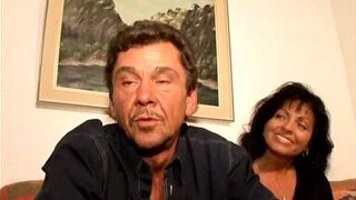 German milf fucking with one cock in her pussy and one in her throat during the threesome - 1 image