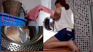 Domination in laundry. Housewife pumped in the washing machine. MIX