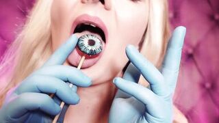 ASMR: blue nitrile gloves and candy engulfing, wearing pink PVC coat, cutie in braces (Arya Grander)
