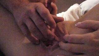 Playing with her big clit and wet pussy while she jerks off my big dick!