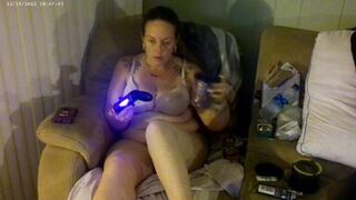 Busty Long Hair Gamer Girl In Bra and Panties Playing Smoking Cigarettes