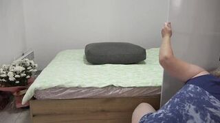 A mature milf with a fat ass is waiting for her lover, changing clothes and trying on Santa Claus to her big boobs. PAWG swaps panties for thongs. Homemade fetish in Christmas socks. Amateur.