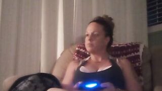 Milf Smoking Cigarettes Playing Video Games In Mini Dress