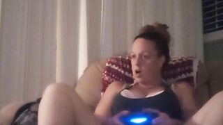 Milf Smoking Cigarettes Playing Video Games In Mini Dress