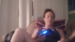 Milf Smoking Cigarettes Playing Video Games In Mini Dress
