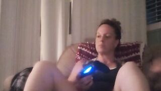 Milf Smoking Cigarettes Playing Video Games In Mini Dress