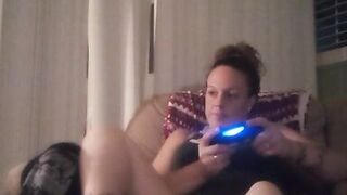 Milf Smoking Cigarettes Playing Video Games In Mini Dress