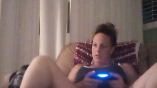 Milf Smoking Cigarettes Playing Video Games In Mini Dress