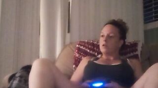 Milf Smoking Cigarettes Playing Video Games In Mini Dress