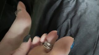 Mistress Lara plays with her perfect feet and toes in silver rings. Foot fetish - 6 image