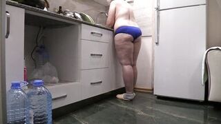 BBW MILF housewife in the kitchen wearing only panties. - 9 image